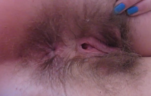 Girl shows off her super hairy asshole in close up